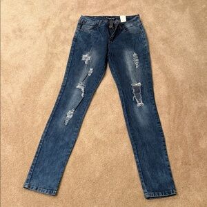 Trendy Distressed Skinny Jeans in Blue